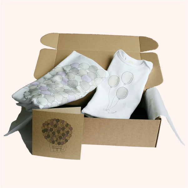 Full Mum-to-Be gift box showing packaged maternity top, baby bodysuit, eco greeting card, and Gooseberry Pink branded box – a complete, ready-to-send present.