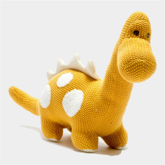 Gender-neutral dinosaur plush toy in mustard colour, safe from birth