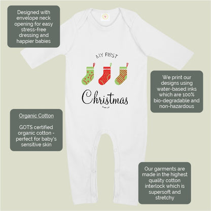 White baby bodysuit with a Christmas-themed graphic reading 'My First Christmas' and three colorful stockings, shown on a light beige background with four dark gray text callout boxes describing fabric and design features.