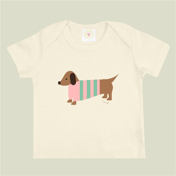 Organic cotton cream baby t-shirt with hand-printed pink sausage dog design