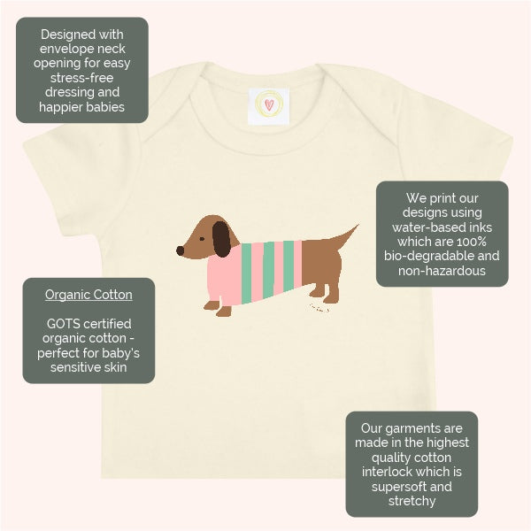 Organic cotton cream baby t-shirt with hand-printed pink sausage dog design