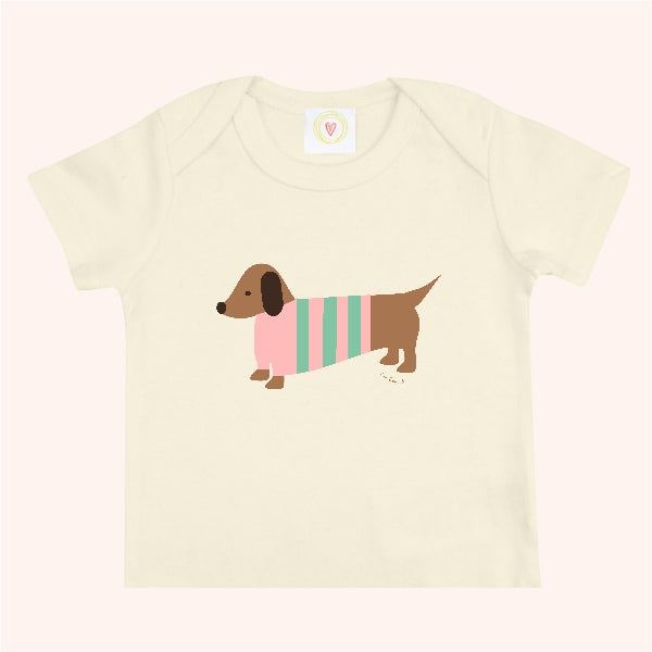 Organic cotton cream baby t-shirt with hand-printed pink sausage dog design