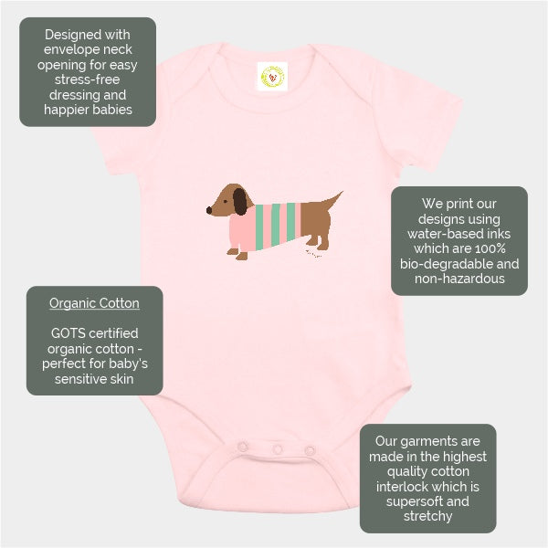 Organic cotton pink baby bodysuit with hand-printed sausage dog design