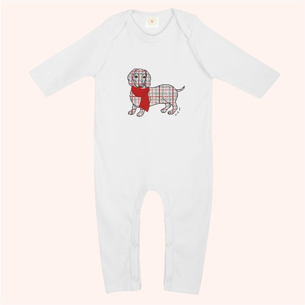 White sleepsuit with tartan sausage dog design