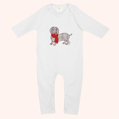 White sleepsuit with tartan sausage dog design
