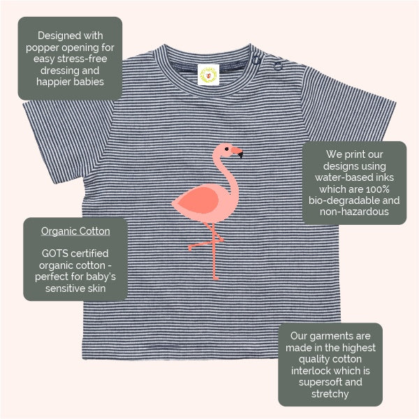 Navy striped baby t-shirt with pink flamingo design and certification labels on a white background