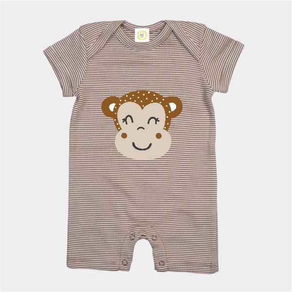 Striped baby romper with monkey face design on a white background