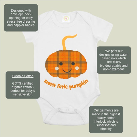 Baby onesie with pumpkin design and text about its features on a light background