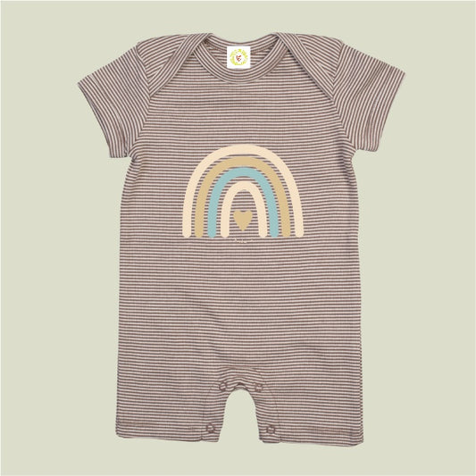 Striped baby romper with rainbow design on a beige background