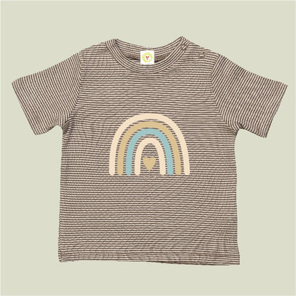 Striped t-shirt with a rainbow design on a beige background