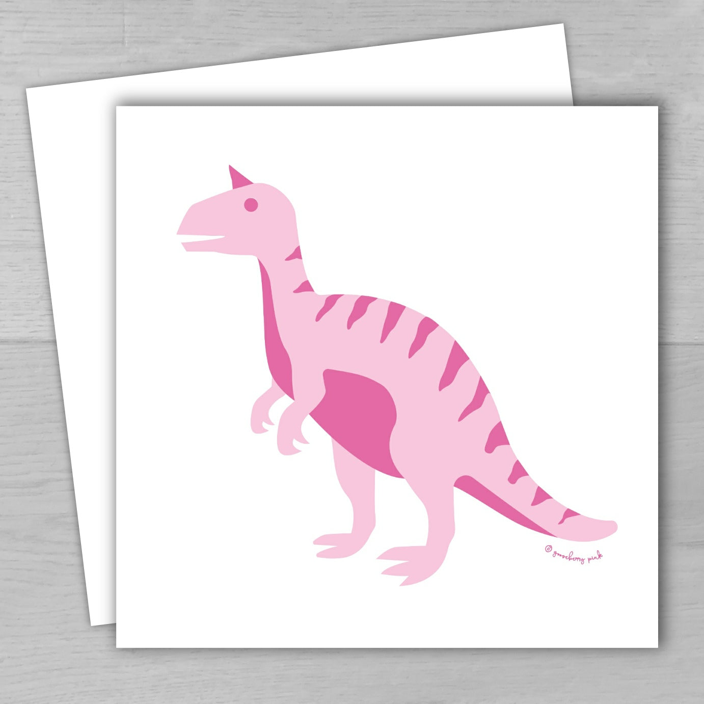 Pink dinosaur illustration on a white card with a gray background
