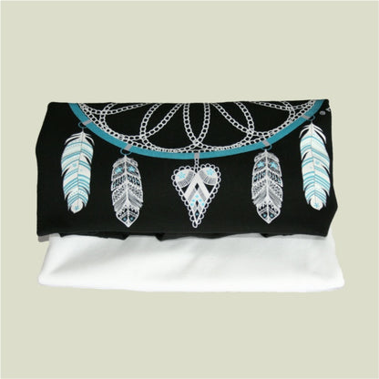 Black headband with feather and chain design on a beige background