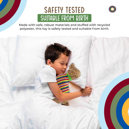 Child sleeping with a toy, surrounded by safety testing and material information text.