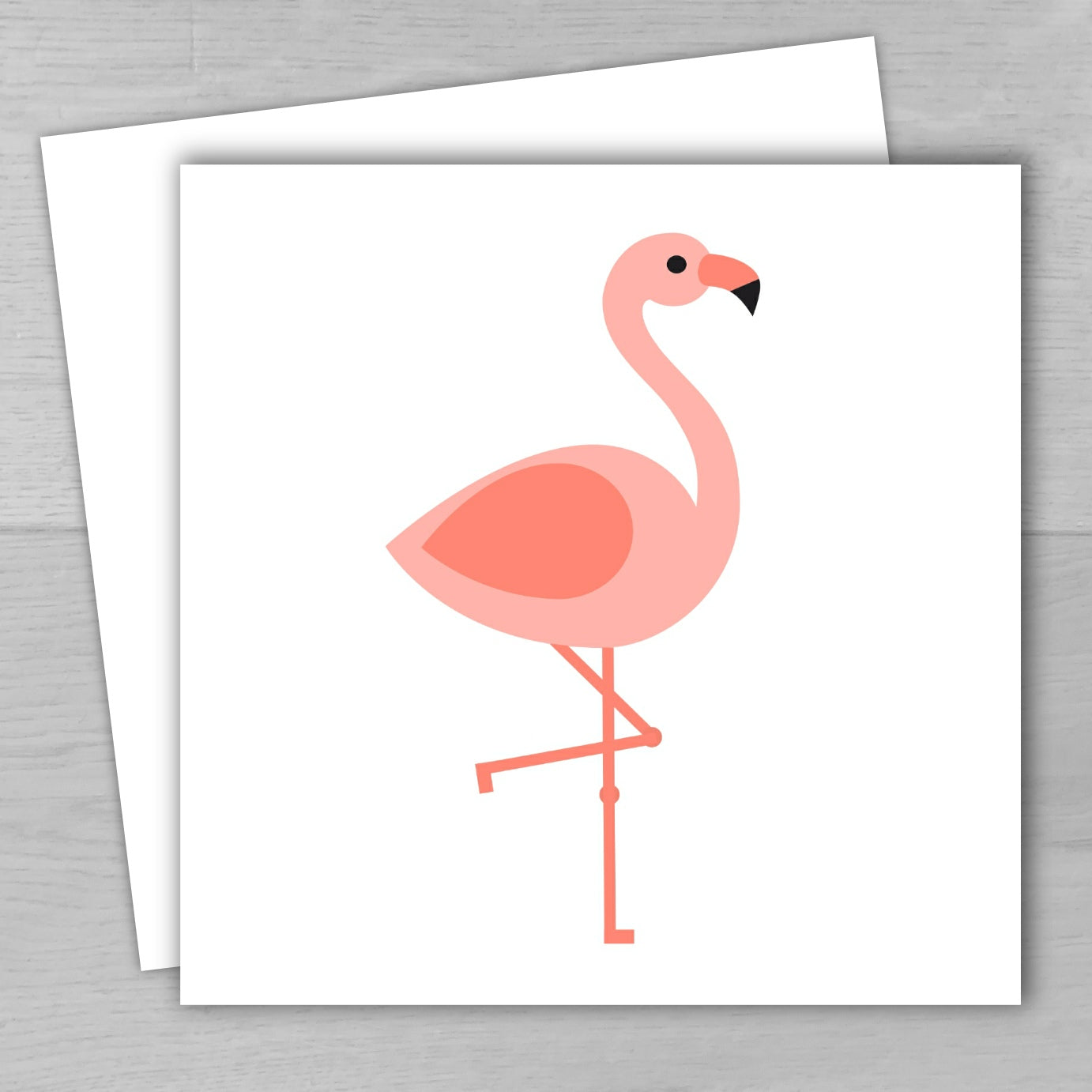 Card with a pink flamingo design on a white background