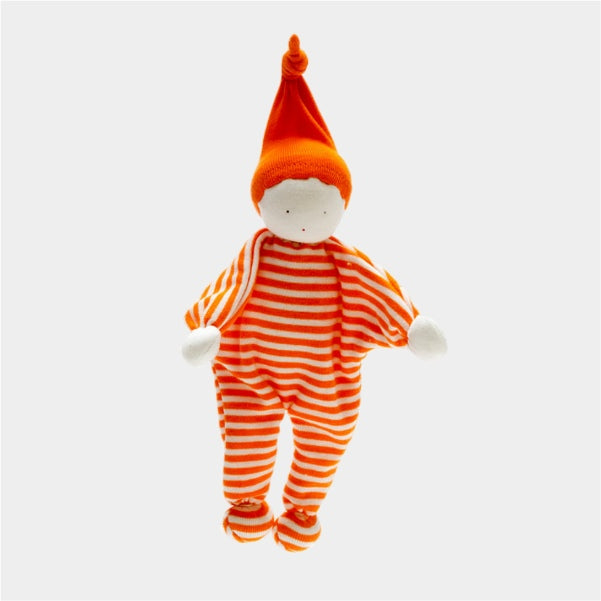 Stuffed toy in orange and white striped outfit with a matching hat on a light gray background
