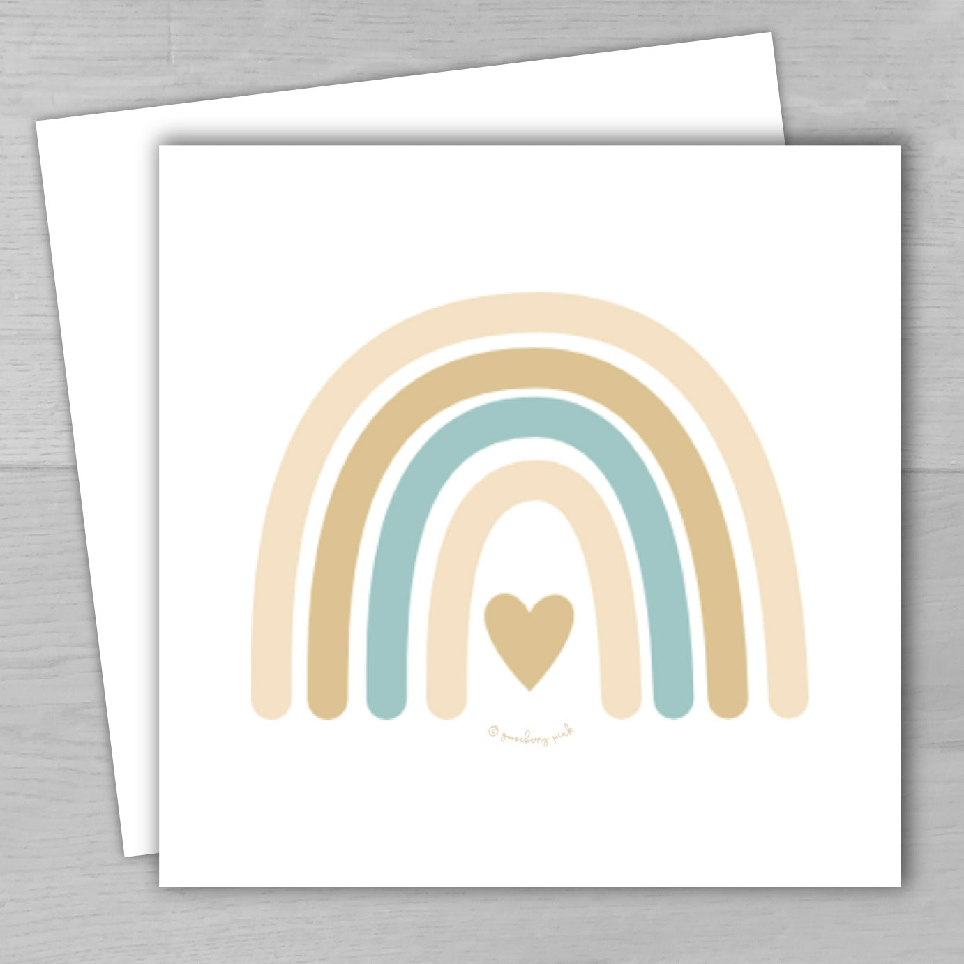 Eco friendly card with beige rainbow on white card.
